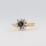 An 18ct yellow gold sapphire and diamond ring, 3.3 grams, size L