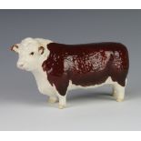 A Beswick Hereford Bull no.13638 modelled by Arthur Greddington 10.8cm, brown and white gloss