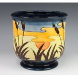 A contemporary Moorcroft jardiniere decorated with bullrushes 22cm