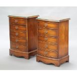 A pair of Georgian style mahogany bow front bedside chests of 5 drawers, raised on bracket feet 75cm