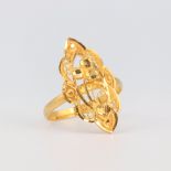 A yellow metal stamped 22ct open dress ring 4.2 grams, size S