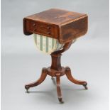 A Regency rosewood and crossbanded figured walnut drop flap work table with fitted interior and