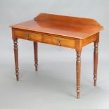 A Victorian mahogany side table/wash stand with raised back, fitted drawers, raised on turned