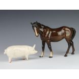 A Beswick Sow no.14528 modelled by Arthur Greddington 9.5cm and a Mare no.976 facing left, brown