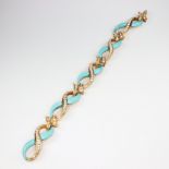 A 1970's yellow metal stamped 750, turquoise and diamond bracelet comprising 115 diamonds graduating