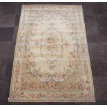 An Abbey yellow and floral patterned Aubusson style carpet 305cm x 199cm Signs of wear to the edge