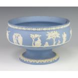 A Wedgwood blue Jasperware pedestal bowl decorated with a band of classical figures 21cm