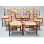 A set of 8 Edwardian Georgian style inlaid mahogany bar back dining chairs with tracery backs and