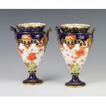 A pair of Royal Crown Derby Imari pattern 2 handled tapered vases decorated with flowers 16cm Both
