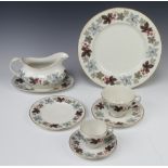 A Royal Doulton Camelot pattern part tea, coffee and dinner service comprising 12 coffee cups, 12