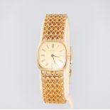 A lady's 18ct yellow gold Patek Philippe wristwatch contained in a rounded square 20mm case, the