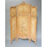 A large and impressive French 19th Century carved lime wood 3 fold draft screen with machine
