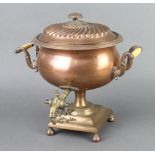 An oval Georgian copper and brass twin handled tea urn, raised on a square base 33cm h x 30cm w x