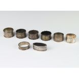 A silver engine turned napkin ring, Birmingham 1912 together with 7 others 176 grams