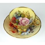 A rare Aynsley teacup and saucer decorated with Roses by Joseph A Bailey (active 1937-1974) the