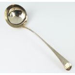 A George IV silver Old English pattern ladle with bright cut decoration London 1827, 156 grams