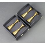 Dansk Design, two pairs of brass candlesticks of waisted form the base marked Dansk Design Denmark