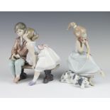 A Lladro figure of a girl sitting on a stool using a telephone 5466 20cm, a Collector's Society