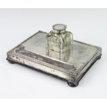 A silver mounted rectangular ink stand with pen tray and mounted inkwell (a/f), London 1908 20cm x