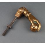 A 19th Century coppered door knocker in the form of a ladies hand clasping a ball 13cm x 4cm x 5cm