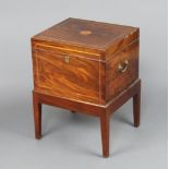 A 19th Century inlaid mahogany rectangular cellarette with hinged lid and fitted interior of 12