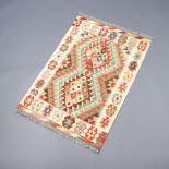 A yellow, turquoise and brown ground Chobi Kilim rug 121cm x 82cm