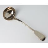 A Victorian silver ladle of fiddle pattern form with engraved crest London 1865, 314 grams