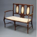 An Edwardian Art Nouveau mahogany double chair back settee raised on cabriole supports 88cm h x