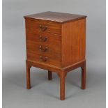 An Edwardian mahogany 4 drawer sheet music chest with brass swan neck drop handles, raised on square