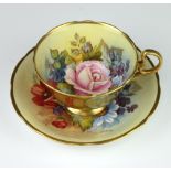 A rare Aynsley teacup and saucer decorated with Roses by Joseph A Bailey (active 1937-1974) the