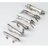 A set of Gallia silver plated knife rests in the form of a cat, lion, bear, rabbit, fox and
