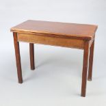 A 19th Century rectangular mahogany tea table on square supports 73cm h x 90cm w x 45cm d Contact