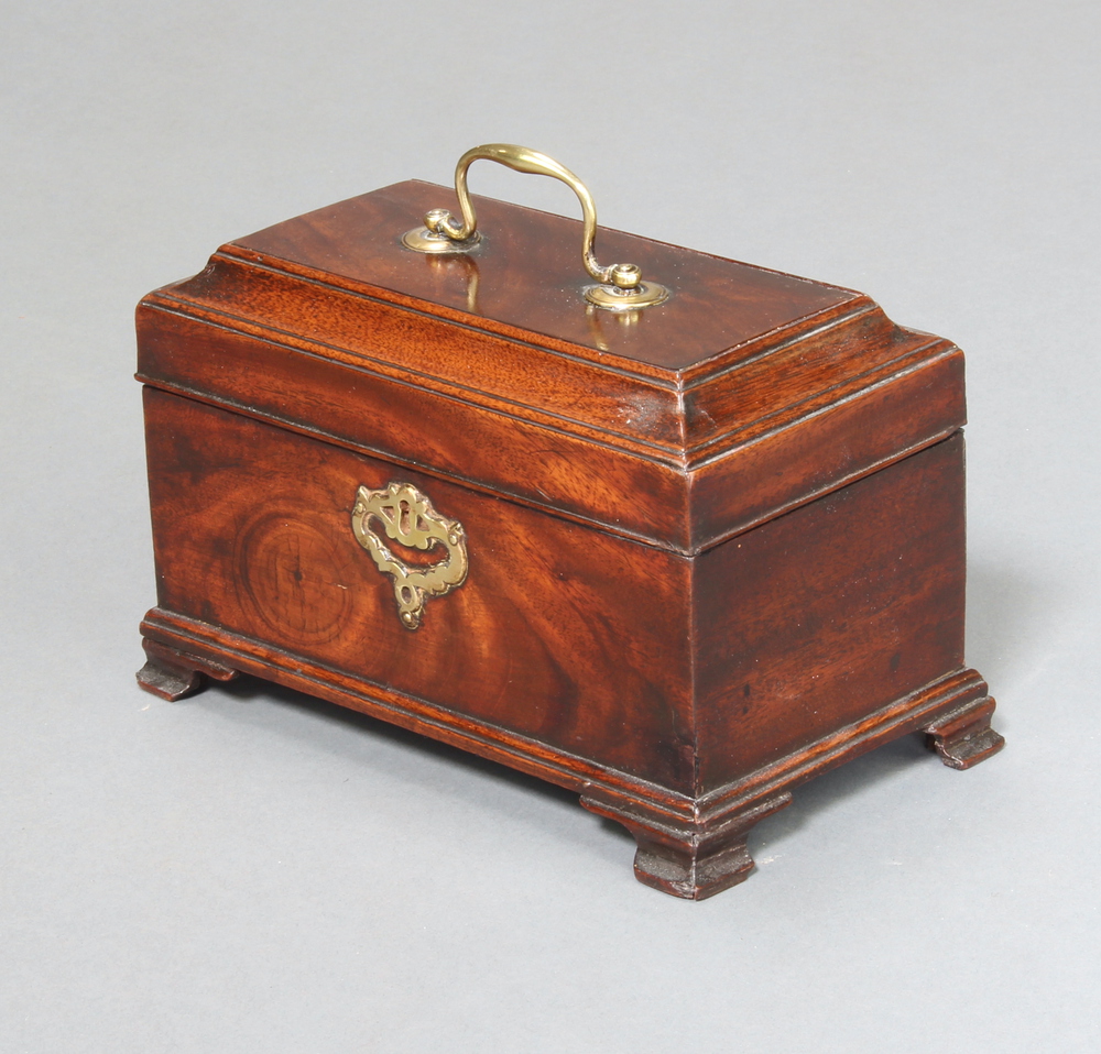 A rectangular Georgian mahogany 3 section tea caddy with hinged lid and brass swan neck drop handle,