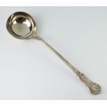 A Victorian silver Kings pattern ladle with engraved crest London 1848, 306 grams The bowl is