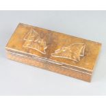 An Art Nouveau embossed coppered trinket box the lid decorated theatrical masks 5cm x 25cm w x