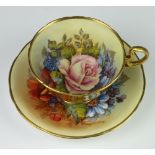A rare Aynsley teacup and saucer decorated with Roses by Joseph A Bailey (active 1937-1974) the