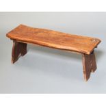 Harry Tonkin, a rectangular carved oak bench raised on standard end supports 33cm h x 91cm w 29cm d,