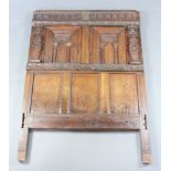 A section of 17th/18th Century carved oak panelling used as a headboard 176cm h x 124cm w 10cm Holed