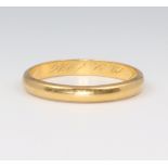 A yellow metal stamped 900 wedding band, 5 grams, size Y