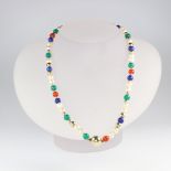 A bead necklace comprising agate, cultured pearls, malachite and hardstone with a yellow metal 585