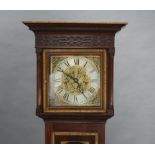 An 8 day striking on bell longcase clock with 20cm gilt dial, silvered chapter ring and Roman