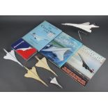 A plastic model aircraft of Concorde 14cm x 15cm x 32cm (pitted to the edges of the wings) and 4