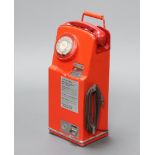 A portable red painted coin slot operated dial telephone 54cm h x 21cm w x 17cm d Some corrosion