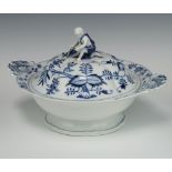 A 19th Century Meissen blue and white 2 handled bowl and cover with figure of a kneeling boy