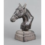 A 20th Century cast metal head and shoulders portrait bust of a horse, raised on a square base