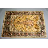 A machine made red and black ground rug decorated exotic birds 191cm x 133cm