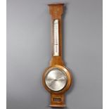 F C Scott of Bristol, a 1930's aneroid barometer and thermometer with silvered dial contained in a