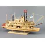 A wooden model King of Mississippi paddle steamer 35cm h x 60cm w x 14cm d