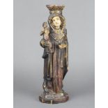 An 18th Century carved and painted wooden figure of the standing Virgin Mary and The Infant Christ