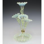 A Victorian vaseline glass epergne with 4 fluted holders 52cm One holder has a repaired base